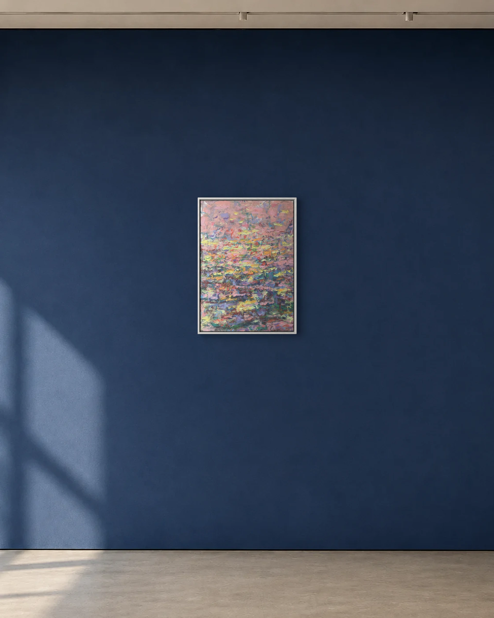 Second Nature shown framed on a deep blue gallery wall